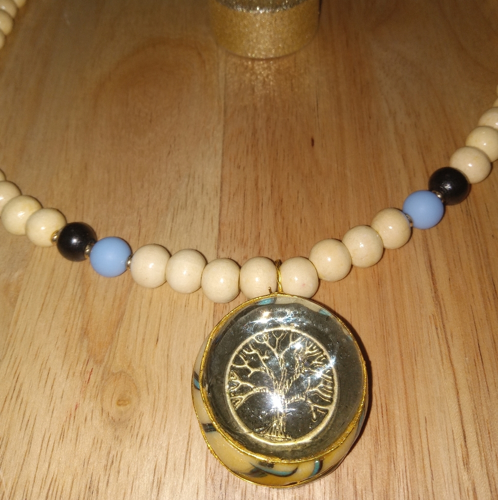 Tree of life emblem on a beaded necklace